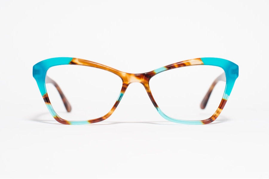 Front view of blue tortoise color block cat eye glasses.